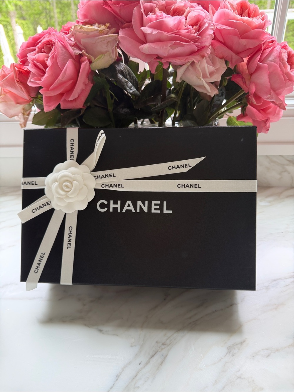 Chsnel beautiful brand new box in black with ribbon and flower